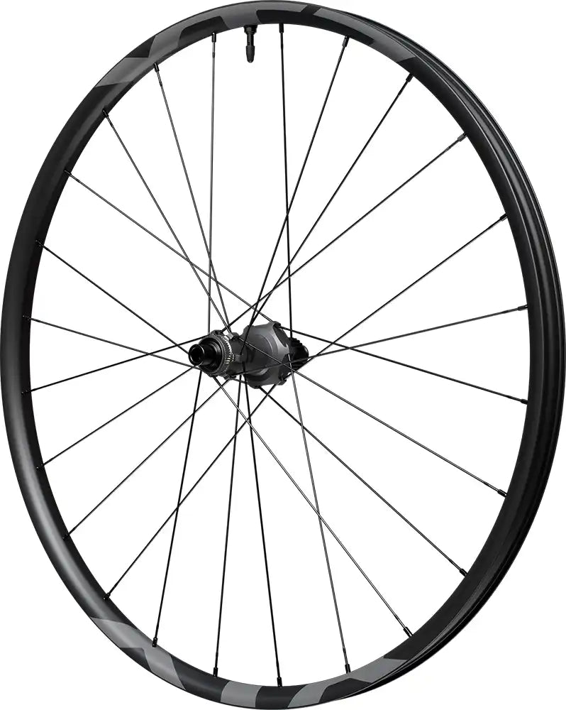 Shimano XTR XC M9200 carbon tubeless disc wheel for mountain biking, showing the sleek black rim and disc brake interface.