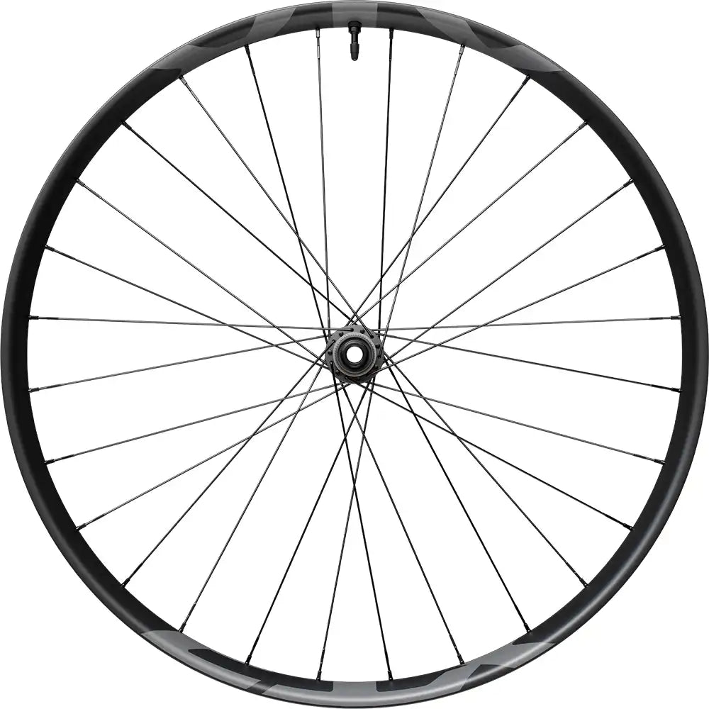 Shimano XTR Enduro M9220 carbon tubeless disc wheel for mountain biking, showing black rim with disc brake interface.