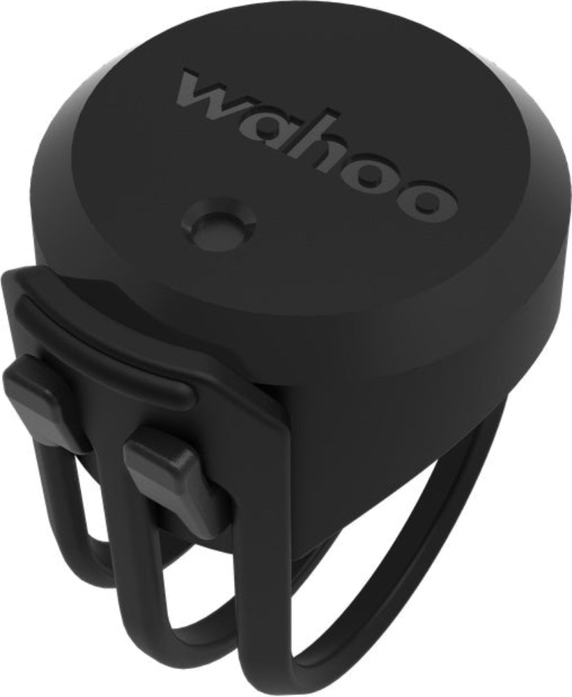 Wahoo TrackR Speed Sensor accessory for cycling, showing compact device with mounting strap and digital display, brand logo visible.