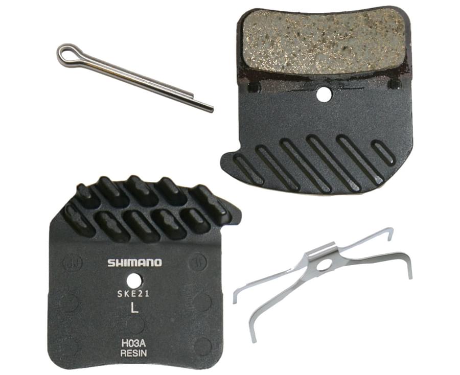Shimano H03A Resin Ice-Tech disc brake pads for bike brakes, showing the brake pad with metal backing and resin friction surface.