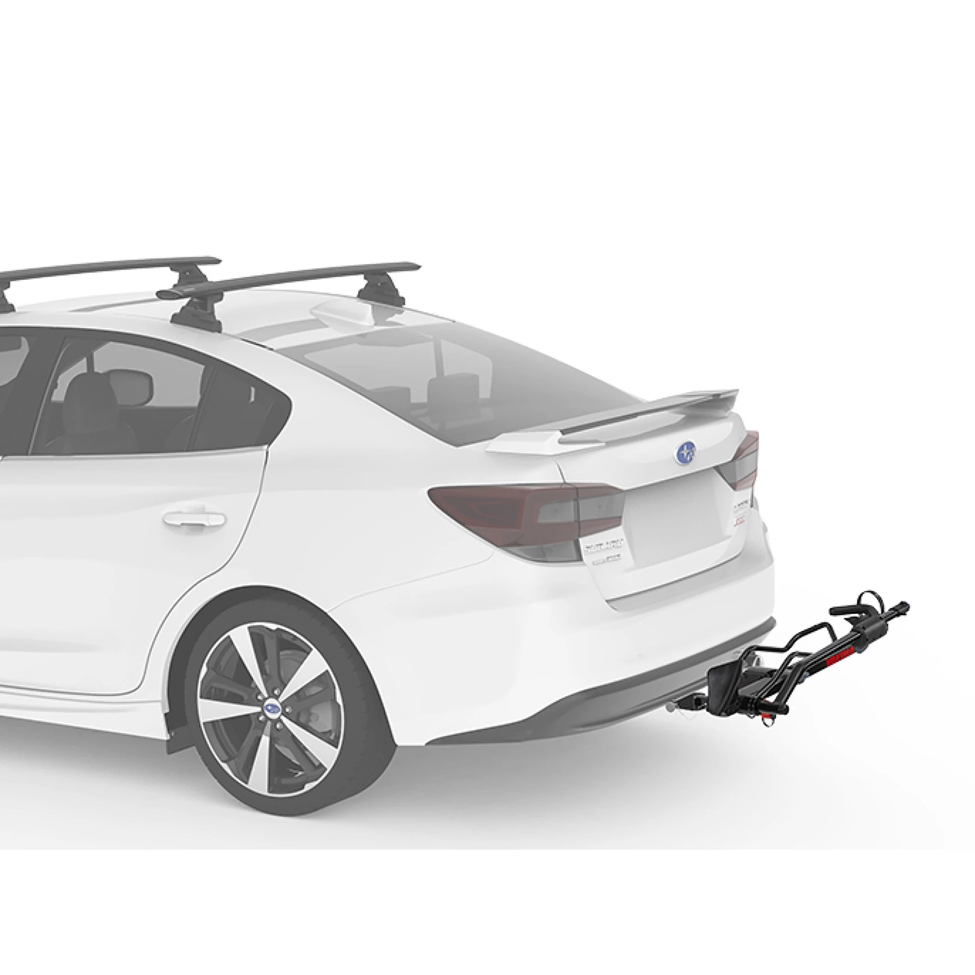 Yakima SingleSpeed 1 Bike Hitch Platform Carrier mounted on a vehicle, showing the black metal frame and bike support arms.