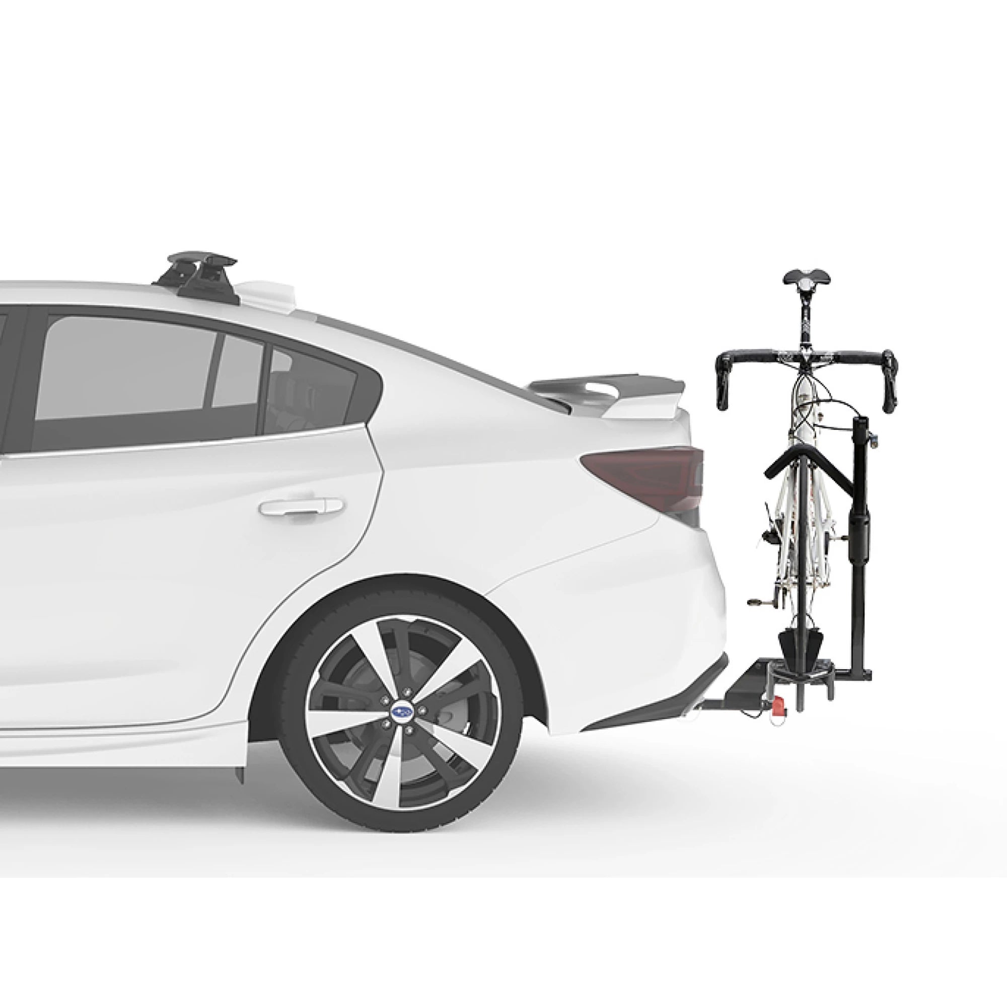 Yakima SingleSpeed 1 Bike Hitch Platform Carrier attached to a vehicle, showcasing durable metal frame and hitch mount.