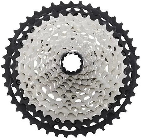 Shimano XT M8100 12-speed cassette with 10-45T gear range, showing the black metal sprockets and gear teeth for mountain bike parts.