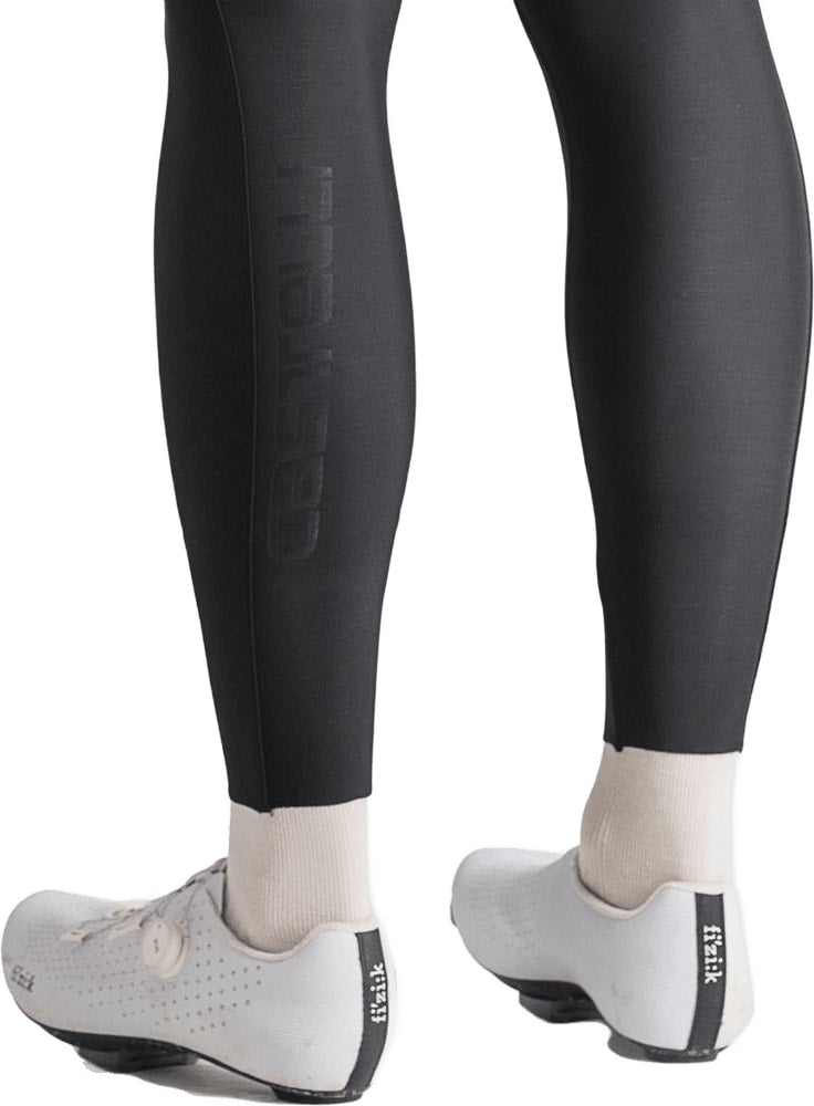 Castelli Espresso men's bib tights featuring a sleek black design, breathable fabric, and comfortable fit for cycling.