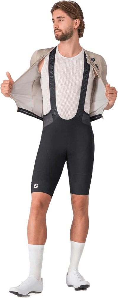Castelli Endurance 4 men's bib knicks, cycling clothing with padded chamois, black and red design, worn by a cyclist.