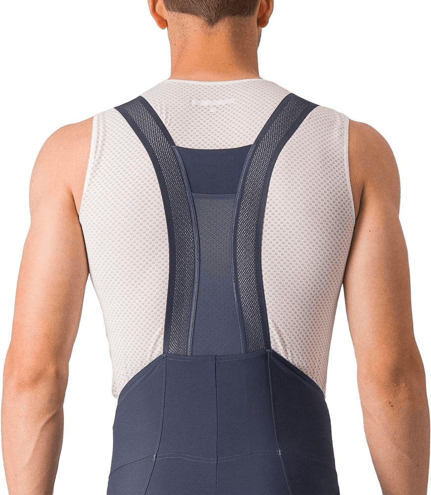 Castelli Espresso men's bib knicks featuring breathable fabric, ergonomic fit, and reflective details for cycling comfort.