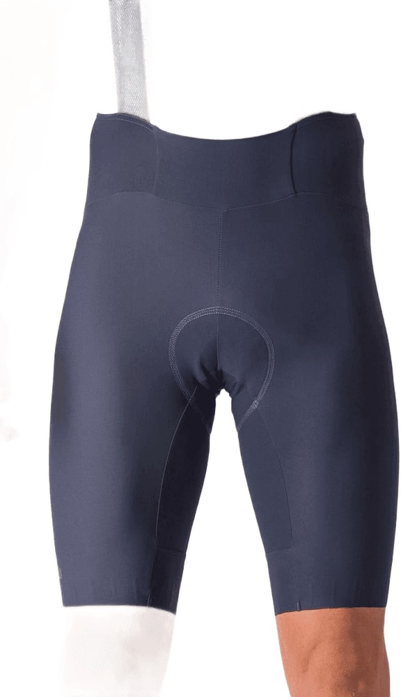 Castelli Espresso men's bib knickers displayed on a hanger, showing their sleek cycling clothing design and lightweight fabric.