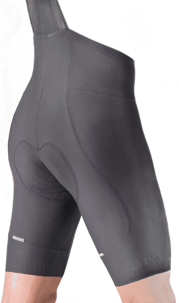Castelli Espresso men's bib knicks, cycling clothing with padded chamois, black and red design, close-up of the front and leg details.