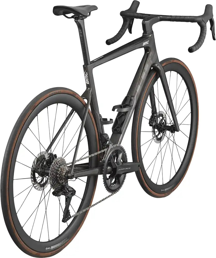 BMC Teammachine SLR 01 FOUR road bike with lightweight frame and aerodynamic design, shown in a sleek black and red color scheme.