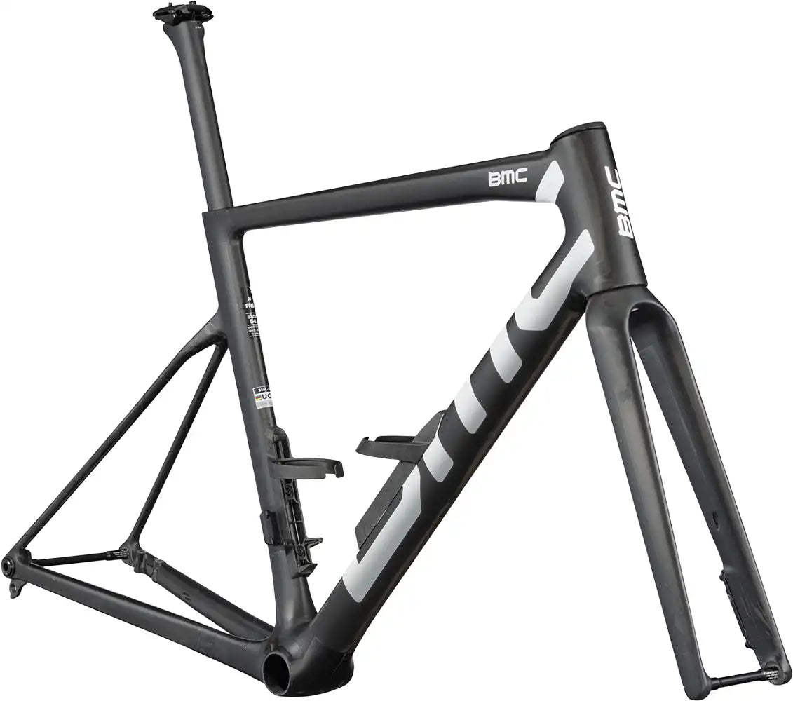 BMC Teammachine SLR 01 road bike frameset in sleek black and red, lightweight carbon frame with aerodynamic design.
