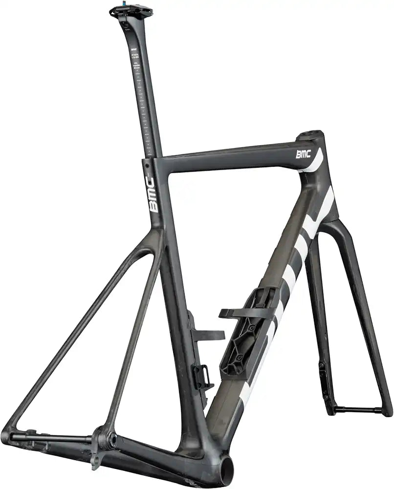 BMC Teammachine SLR 01 road bike frameset in sleek black and red, lightweight carbon construction for high-performance cycling.
