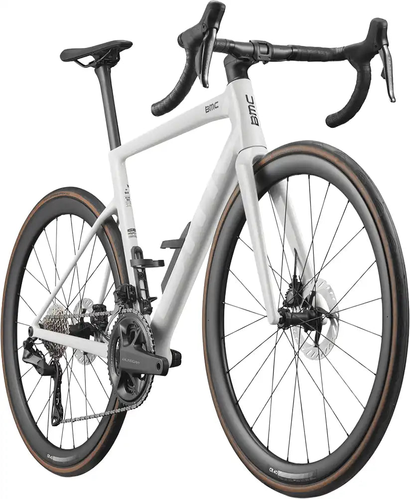 Black BMC Teammachine SLR 01 SIX road bike with aerodynamic frame and drop handlebars, ready for racing or performance cycling.