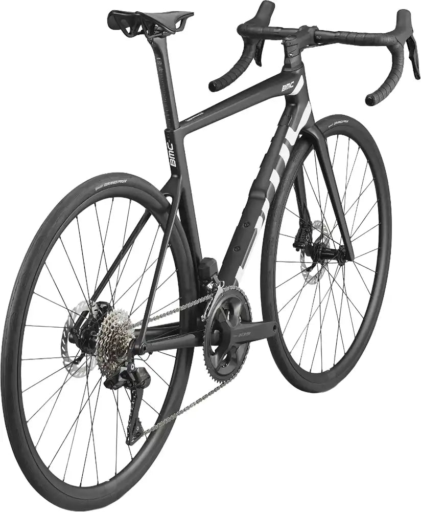 Black BMC Teammachine SLR TWO road bike with lightweight frame, drop handlebars, and sleek design suitable for racing and performance riding.