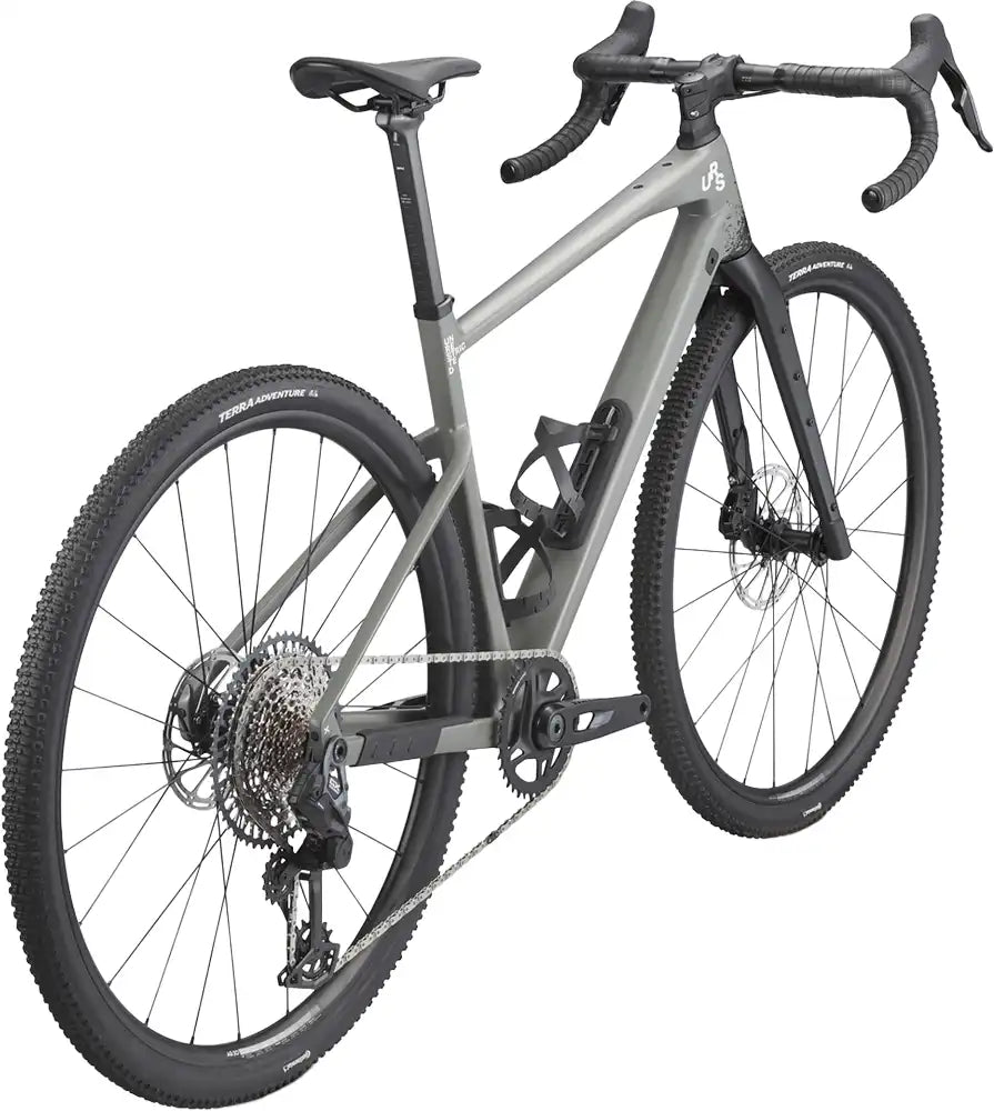 BMC URS ONE gravel bike with lightweight frame, knobby tires, and drop handlebars, designed for off-road cycling adventures.