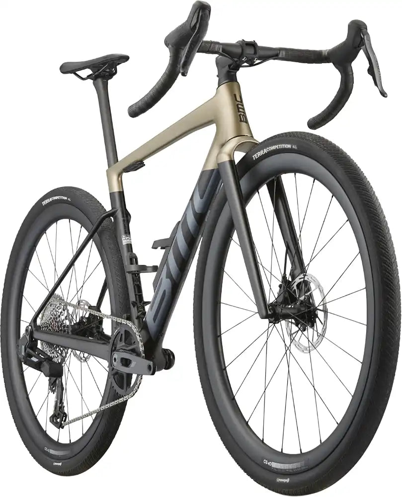 BMC Kaius 01 Gravel Bike with lightweight frame and drop handlebars, ready for off-road adventures.
