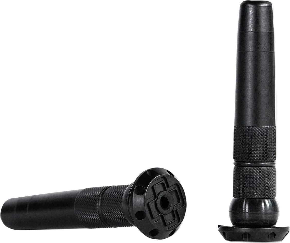 Muc-Off Sealth tubeless plugs for bicycle tires, showing black rubber bicycle tire accessories on a neutral background.