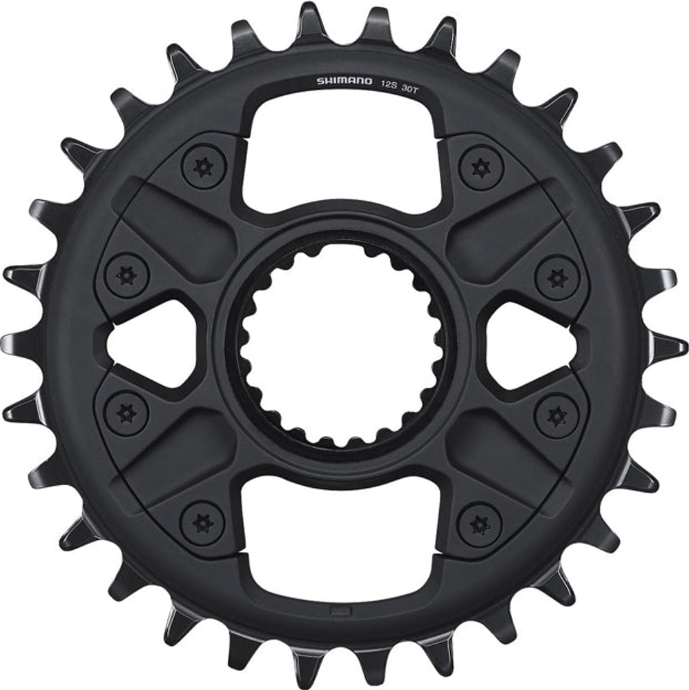 Shimano Deore M6100 12-speed chainring for mountain bike drivetrain, silver metal part with gear teeth.