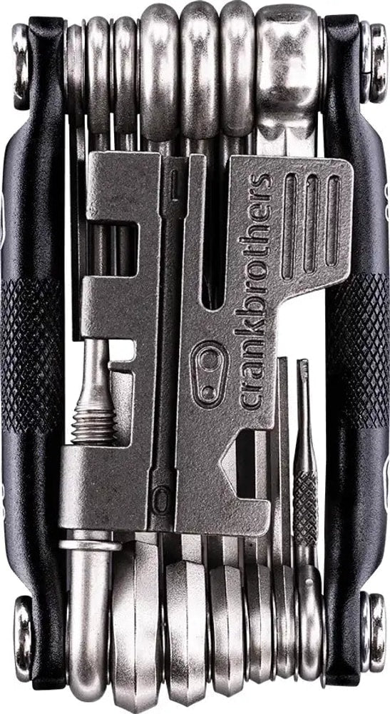 Crankbrothers M20 multi tool showing various Allen wrenches and screwdrivers in a compact, portable accessories kit.