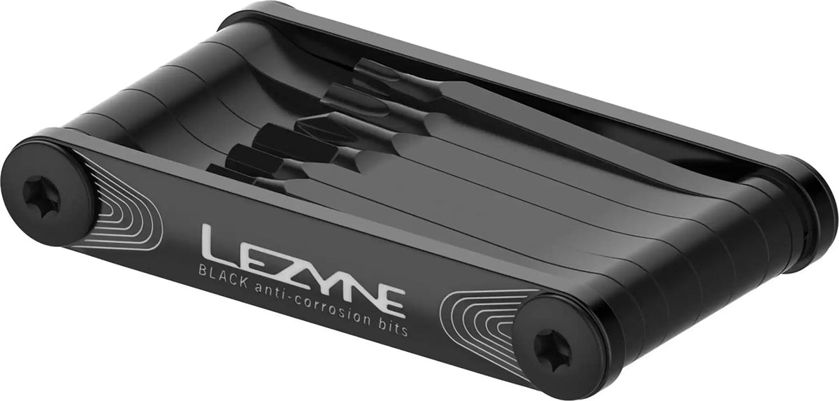 Lezyne V Pro 11 multi tool accessories with various Allen wrenches, screwdrivers, and other cycling repair tools laid out.