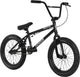 Raven Trickster 18 BMX bike with black frame and colorful graphics, designed for youth riders and stunt riding.
