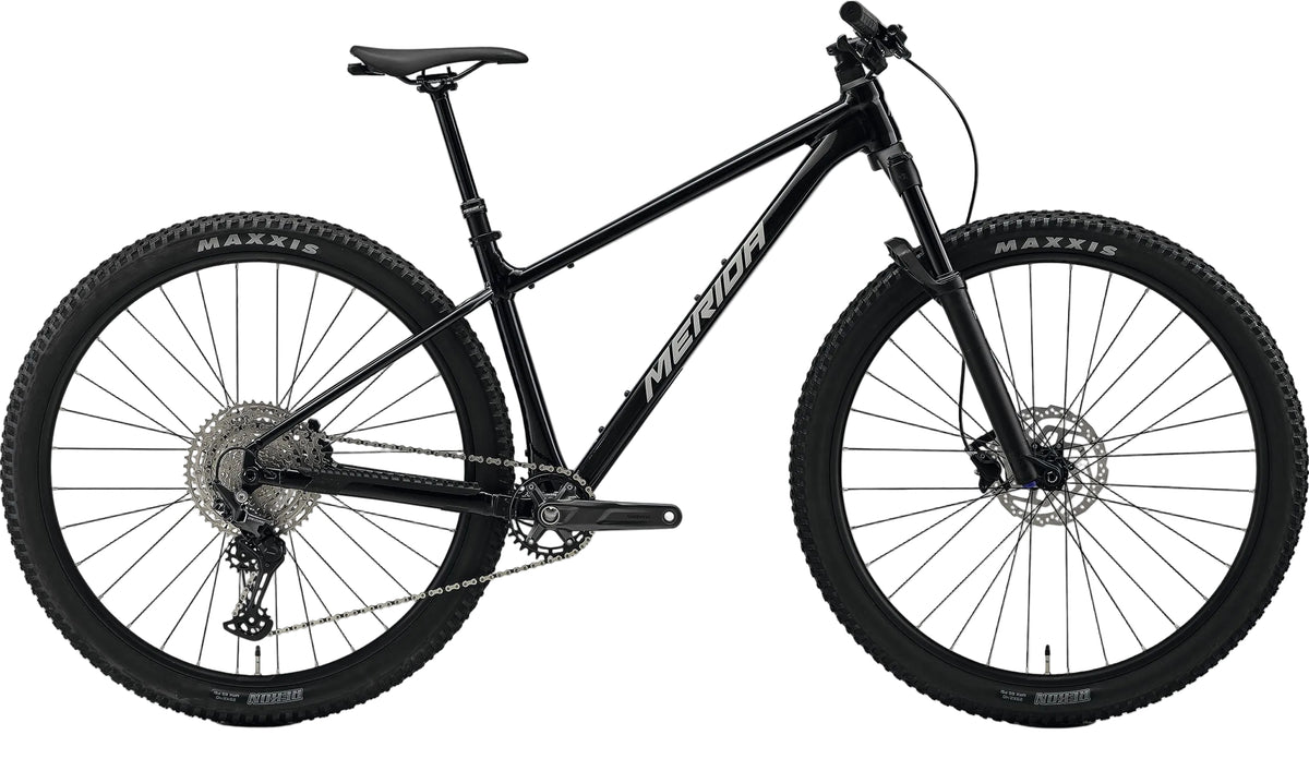 2027 Merida Big Nine TR 700 hardtail mountain bike with black silver frame and 26-inch wheels, designed for trail riding.