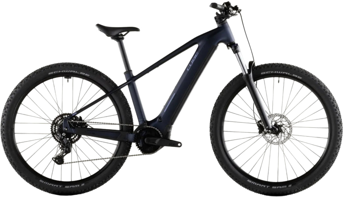 Cube Reaction Hybrid Performance 600 e-bike in Indigo Blue with sleek frame, Bosch motor, and modern design for versatile riding.