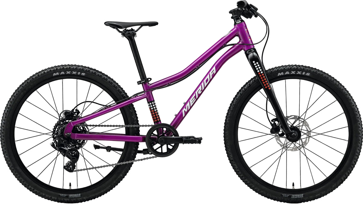 Kids' Merida Matts J24 disc bike featuring a sturdy frame, colorful design, and disc brakes for young riders.