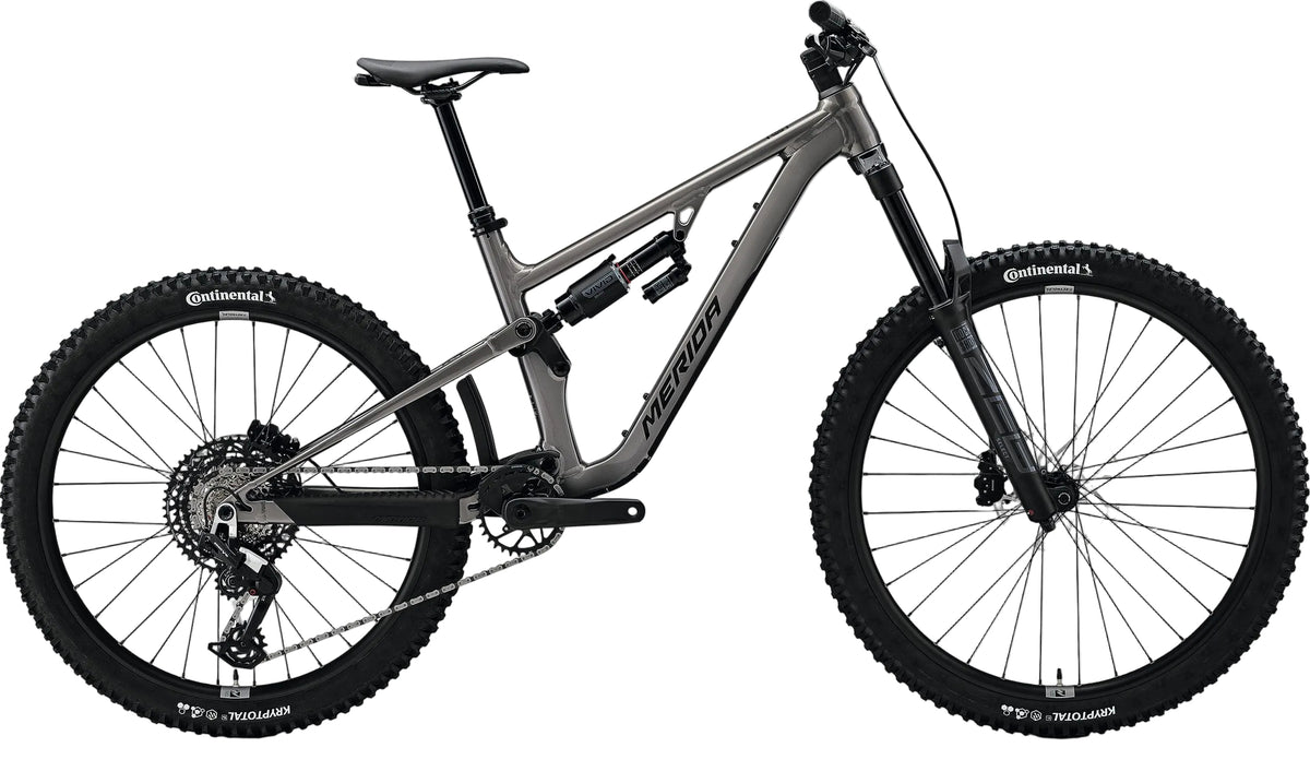 Gray and black Merida One Sixty 700 dual suspension mountain bike with sturdy frame and front and rear shock absorbers.
