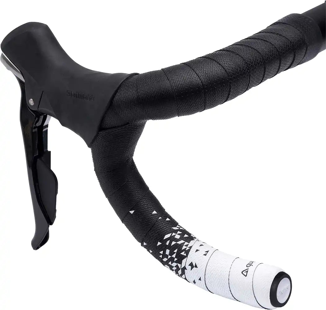 Guee SL Dual Handlebar Tape in white, cycling accessories, showing the textured tape wrapped around bike handlebars for grip.