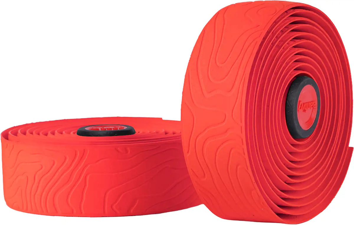 Guee Dura silicone handlebar tape in red, a cycling accessory with cushioned grip and durable silicone material for road bikes